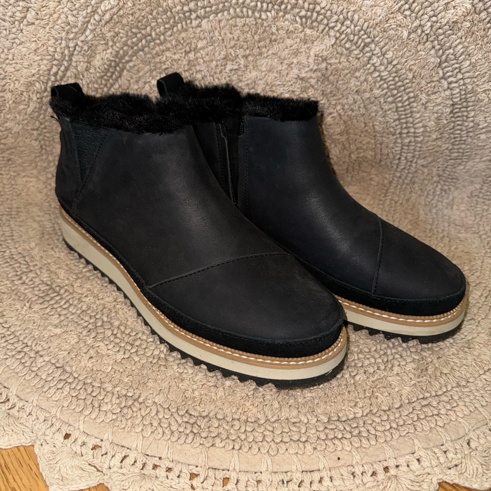 Black Tom’s boots